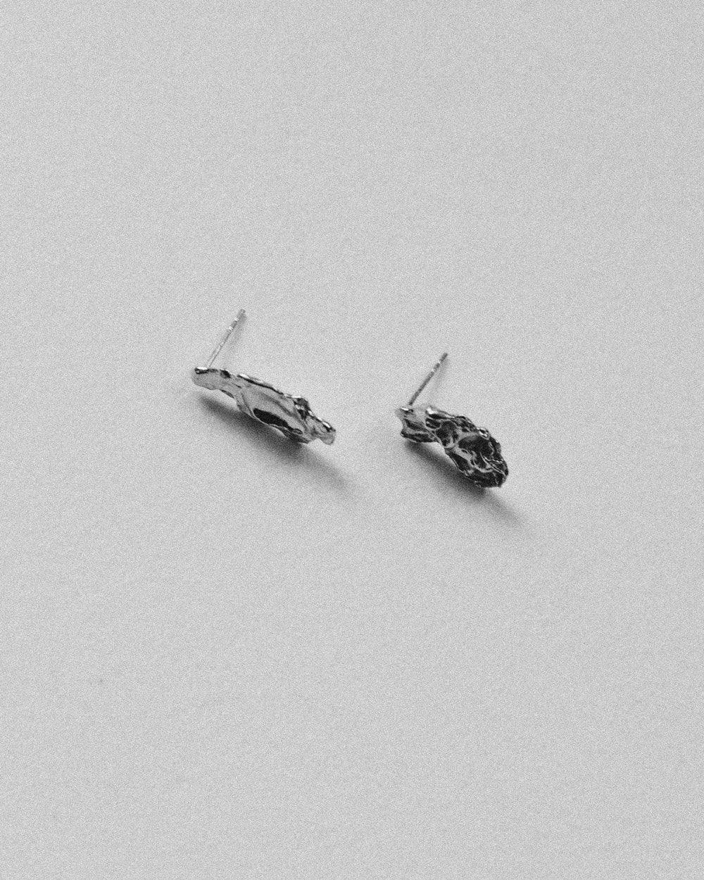 soft and sticky sterling silver molten silver earring made in canada