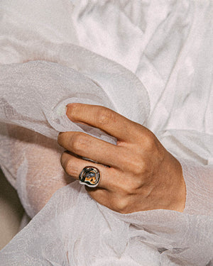 soft and sticky sterling silver ring designed to wear many different ways, looks different from every angle