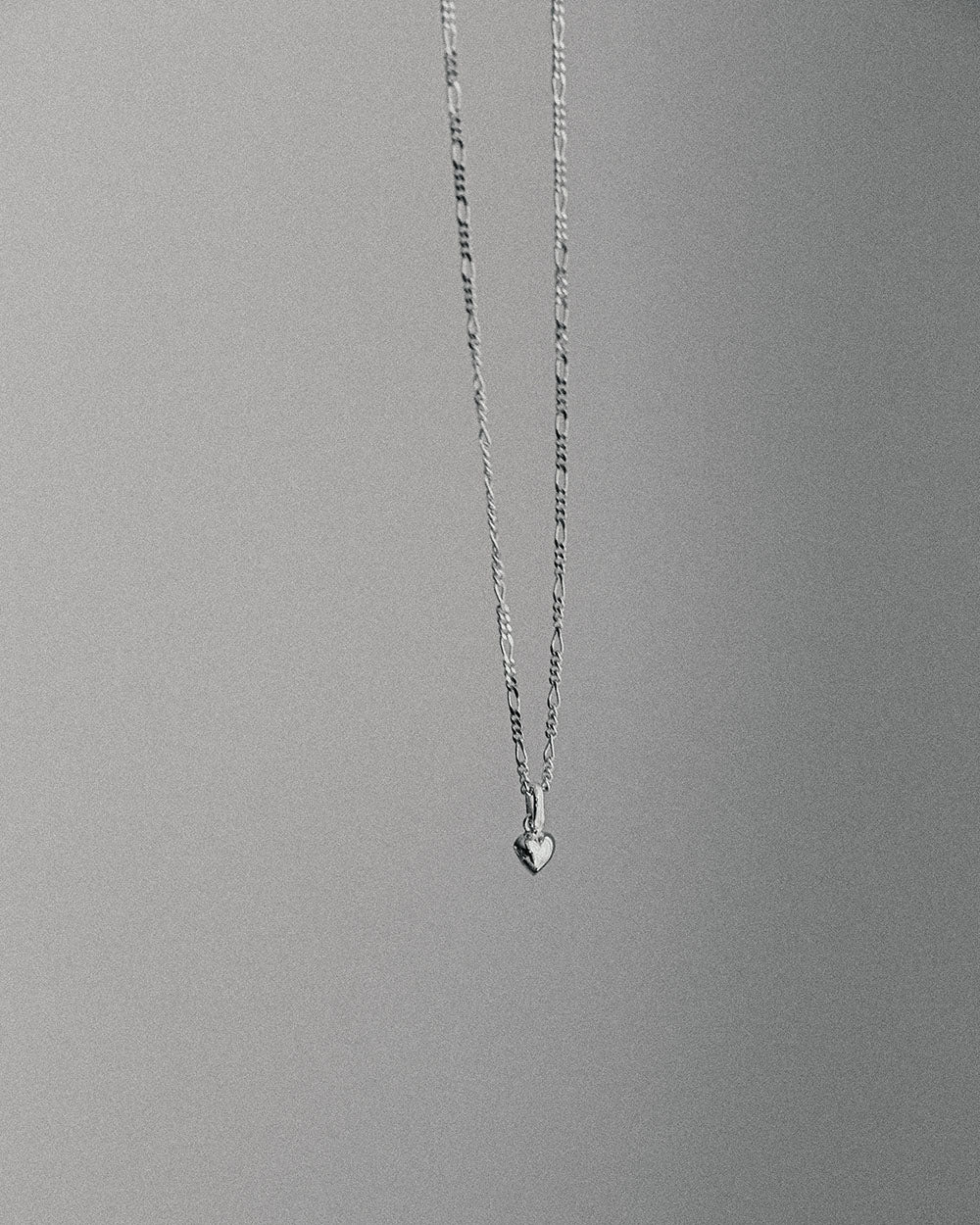 soft and sticky Pendant measures about 5mm, Figaro chain is shy of 2mm wide. Photos show the Minikin Necklace strung on a 20" chain paired with the Round Snake Chain (Thin). Made from Sterling Silver that doesn’t contain metal additions that can typically cause infections or allergic reactions.